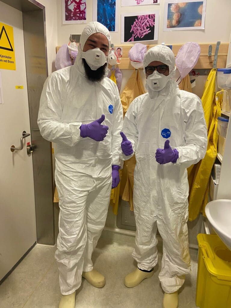 Roberto Aghaei with colleague in ppe