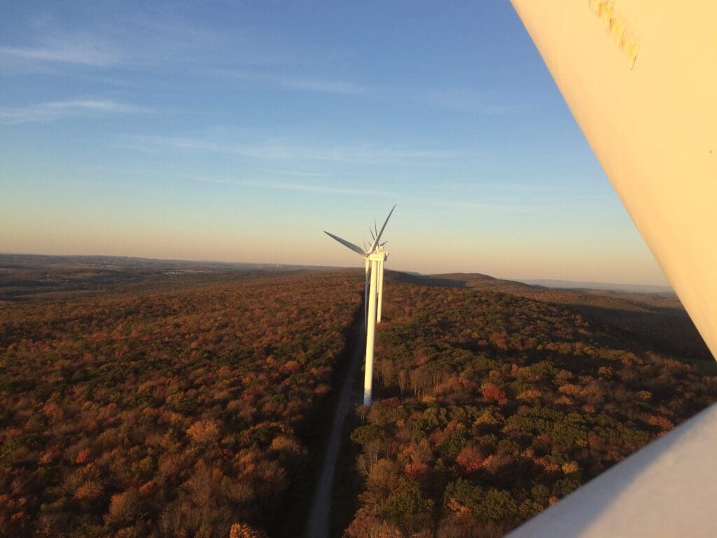 wind power with autumn trees