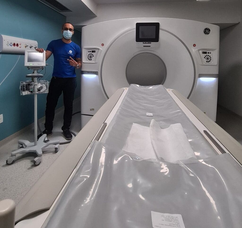 Completing a CT scan installation for GE Healthcare Fausto Cruz