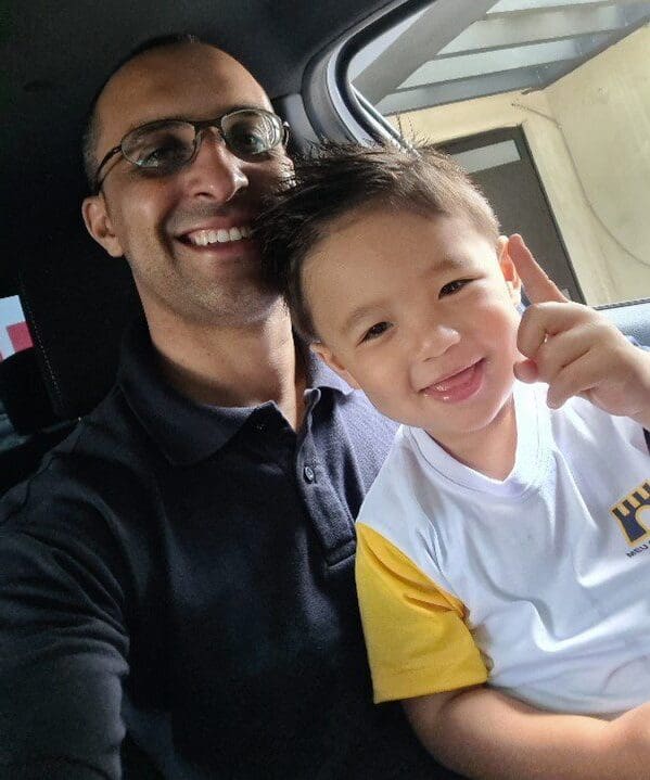 Fausto Cruz with his son