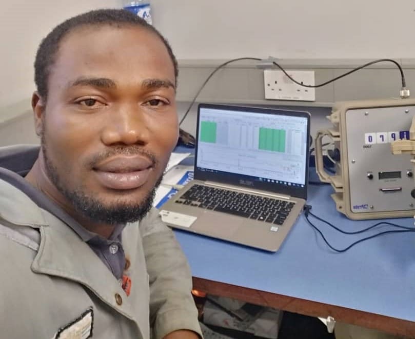 Christopher Akaya Well Test Operator at his desk