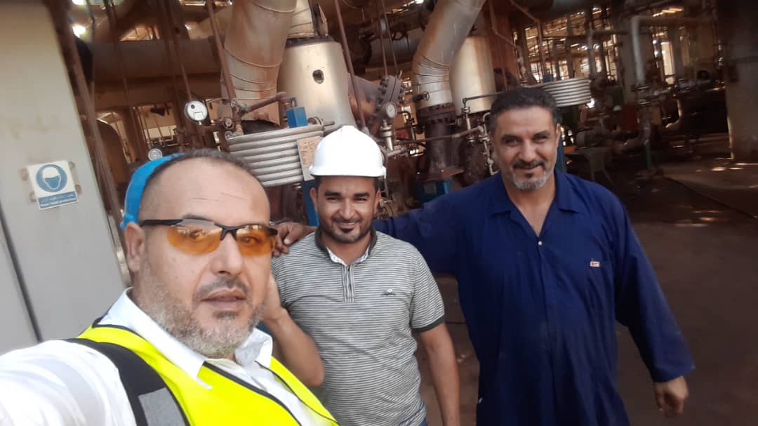 Hisham Gialal, Sales and service engineer, with colleagues in Azzawiya Oil Refinery Azzawiya Oil Refining Company (ARC)