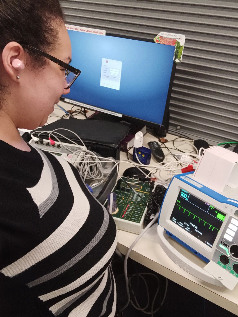 Nicole-Ruffin-Biomedical Technician Biomed with equipment