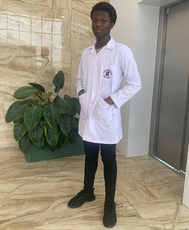 Samuel Danquah Ankapong wearing lab coat author of Reasons to study Biomedical Engineering